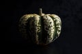 Sweet dumpling pumpkin on black table Royalty Free Stock Photo