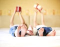 Sweet family in bed. Three sisters, close up on feet Royalty Free Stock Photo