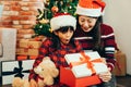 Sweet family opening Christmas gifts