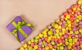 Sweet festive background. Gift box and caramel popcorn Royalty Free Stock Photo