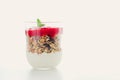 Homemade granola parfait with strawberry jam and mint, yogurt and muesli for healthy breakfast in the morning Royalty Free Stock Photo