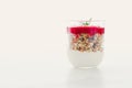 Homemade granola parfait with strawberry jam and mint, yogurt and muesli for healthy breakfast in the morning Royalty Free Stock Photo