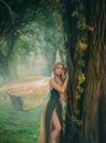 Sweet forest angel, nymph with perfect thick white hair in image of dreamy spirit with butterfly wings. attractive fairy