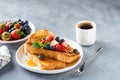 Sweet french challah toast with berries and syrup Royalty Free Stock Photo