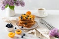 Sweet french toast with berries and honey served on plate. Copy space for text. Healthy breakfast: toasts with blueberry and Royalty Free Stock Photo