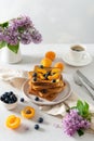 Sweet french toast with berries and syrup served on plate. Copy space for text. Healthy breakfast: toasts with blueberry and Royalty Free Stock Photo