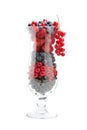 Sweet fresh berries in cocktail glass, isolated