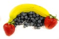 Sweet fresh blueberry`s and a yellow banana with two strawberry`s Royalty Free Stock Photo