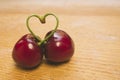 Sweet fresh cherries in film style with pies heart-shaped.