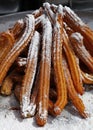 Sweet fresh churros snack with sugar close up