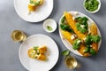 Sweet fried corn with basil sauce, feta cheese, wine top view Royalty Free Stock Photo