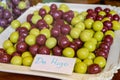 Sweet fruit candy beads in artisan Spanish confectionery shop, english translation: olives