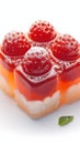 Sweet fruit dessert jelly adorned with strawberries on white background