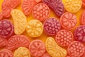 Sweet fruit hard candies background. Overhead view of colorful caramel assortment