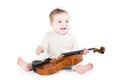 Sweet funny baby playing violin Royalty Free Stock Photo