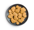 Sweet gingerbread hearts on plate isolated on white background Royalty Free Stock Photo