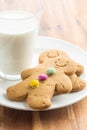 Sweet gingerbread man and glass of milk. Royalty Free Stock Photo