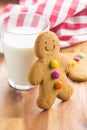 Sweet gingerbread man and glass of milk. Royalty Free Stock Photo