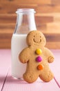 Sweet gingerbread man and milk bottle. Royalty Free Stock Photo