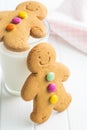 Sweet gingerbread men and glass of milk. Royalty Free Stock Photo