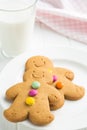 Sweet gingerbread men and glass of milk. Royalty Free Stock Photo