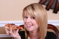Sweet girl eating pizza Royalty Free Stock Photo