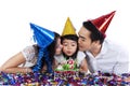 Sweet girl with her parents celebrate birthday Royalty Free Stock Photo