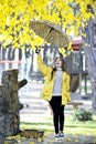 Sweet girl jumping with umbrella Royalty Free Stock Photo