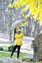 Sweet girl jumping with umbrella Royalty Free Stock Photo