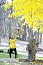 Sweet girl jumping with umbrella Royalty Free Stock Photo