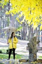 Sweet girl jumping with umbrella Royalty Free Stock Photo