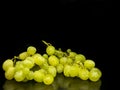 Sweet green grapes on black background Royalty Free Stock Photo