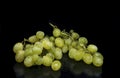 Sweet green grapes on black background Royalty Free Stock Photo