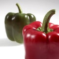 Sweet Green and Sweet Red Pepper, capsicum annuum, Vegetables against White Background Royalty Free Stock Photo