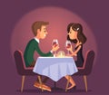Sweet happy young couple having romantic dinner with glasses of red wine Royalty Free Stock Photo
