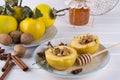 Sweet healthy dessert. Fruit quince with honey Royalty Free Stock Photo