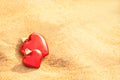 Sweet heart on sand beach warm light. abstract background love