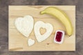Sweet heart shaped sandwich with jam, banana and butter - recipe. Set photo 02 of 5 Royalty Free Stock Photo