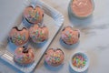 cupcakes with icing and sprinkles