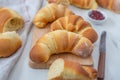 Sweet home made croissant with jam on a table Royalty Free Stock Photo