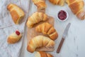 Sweet home made croissant with jam on a table Royalty Free Stock Photo