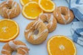 Sweet home made orange donuts on a table Royalty Free Stock Photo