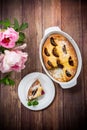 Sweet homemade casserole with fruits inside in a plate