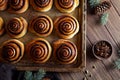 Sweet Homemade christmas baking. Cinnamon rolls buns with cocoa filling. Kanelbulle swedish dessert. Royalty Free Stock Photo