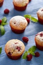 Sweet homemade raspberry muffins on wooden table. Royalty Free Stock Photo