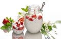 sweet homemade yogurt with strawberry jam and fresh strawberries in a glass cup Royalty Free Stock Photo