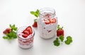 sweet homemade yogurt with strawberry jam and fresh strawberries in a glass cup Royalty Free Stock Photo