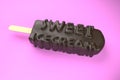 Sweet icecream text on classic chocolate ice cream isolated on pink background 3d illustration