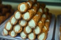 Sweet italian desssert, pile of cannoli pastry filled with ricotta cream cheese