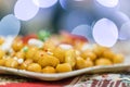 Sweet Italian Struffoli, small balls fried and dipped in honey, Neapolitan dessert of Christmas holidays